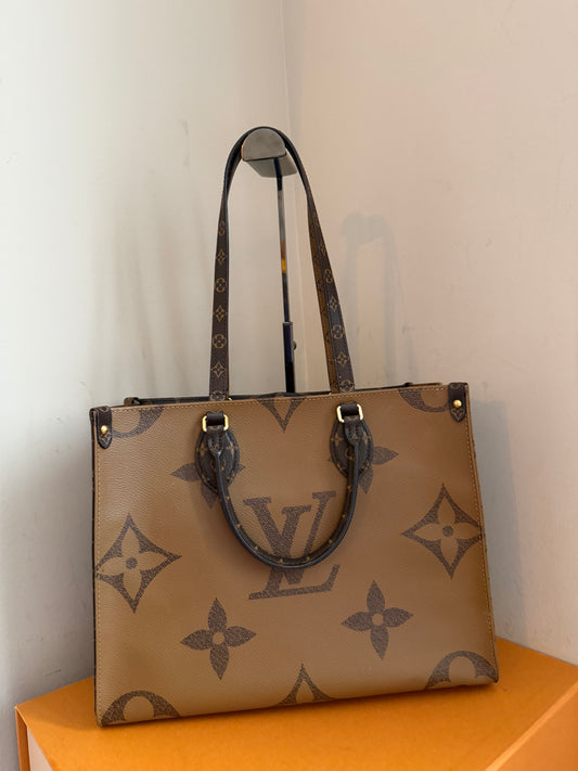 ❗️SOLD❗️On-The-Go MM reverse monogram